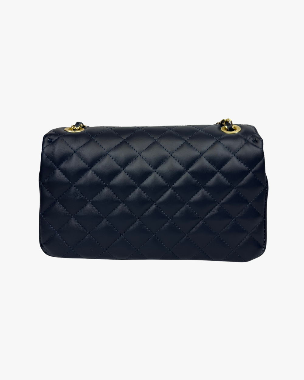 Parte trasera del bolso Juliette Navy, destacando el cuero vegano acolchado y la calidad en los acabados.